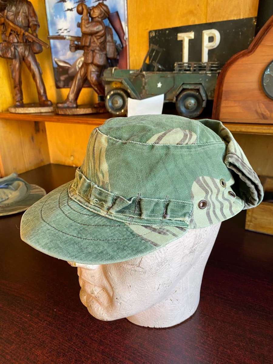 RHODESIAN CAMO FLAP CAP-USED BUT GOOD CONDITION-INSIDE RING MEASURES 56 CM