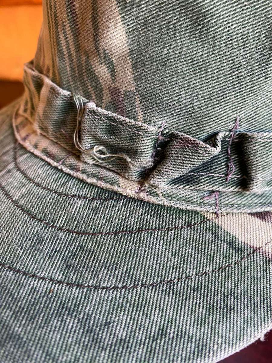 RHODESIAN CAMO FLAP CAP-USED BUT GOOD CONDITION-INSIDE RING MEASURES 56 CM
