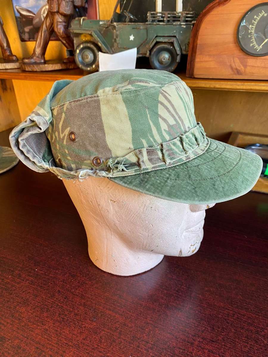 RHODESIAN CAMO FLAP CAP-USED BUT GOOD CONDITION-INSIDE RING MEASURES 56 CM