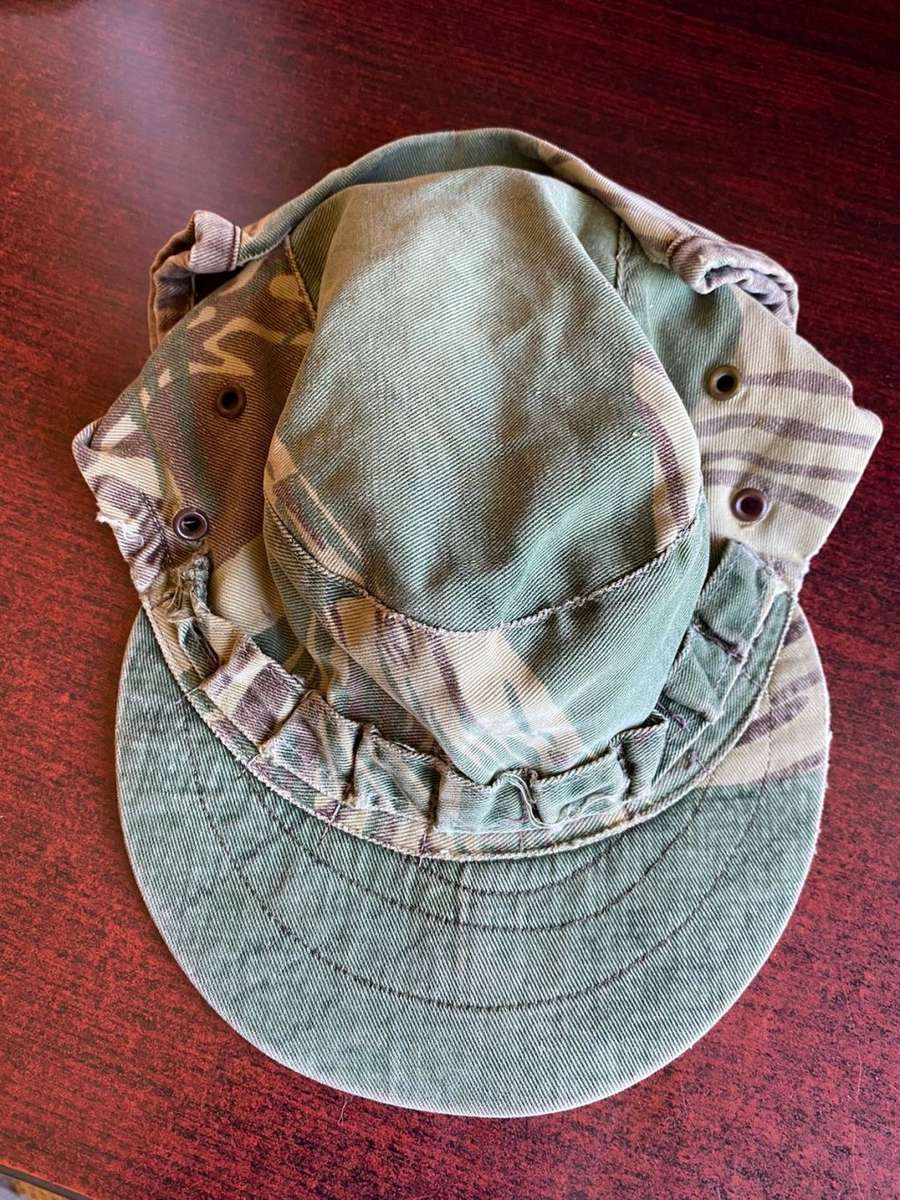 RHODESIAN CAMO FLAP CAP-USED BUT GOOD CONDITION-INSIDE RING MEASURES 56 CM