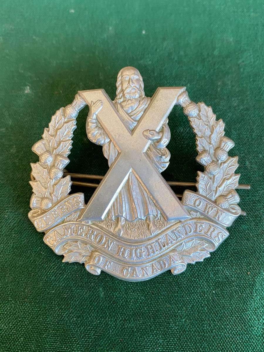 CAMERON HIGHLANDERS OF CANADA CAP BADGE- 2 LUGS