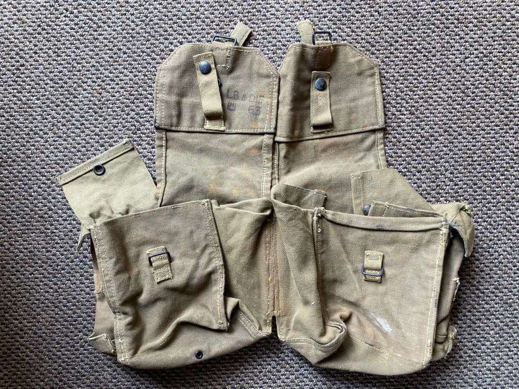 RHODESIAN KIDNEY POUCHES-PATTERN 63-MAKER STAMPED AND DATED-NEVER USED