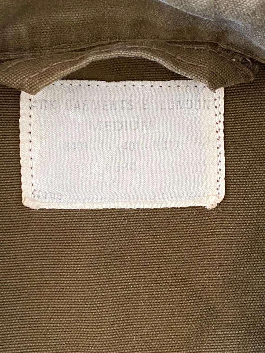 SADF NUTRIA,LONG SLEEVE SHIRTS-1X SMALL AND 1X MEDIUM-BOTH USED BUT GOOD CONDITION WITH AL BUTTONS