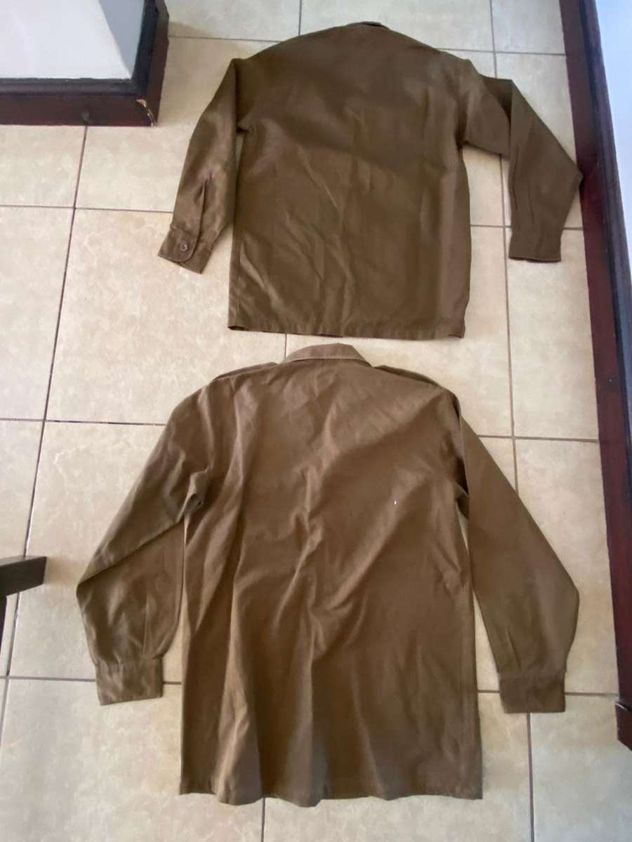 SADF NUTRIA,LONG SLEEVE SHIRTS-1X SMALL AND 1X MEDIUM-BOTH USED BUT GOOD CONDITION WITH AL BUTTONS