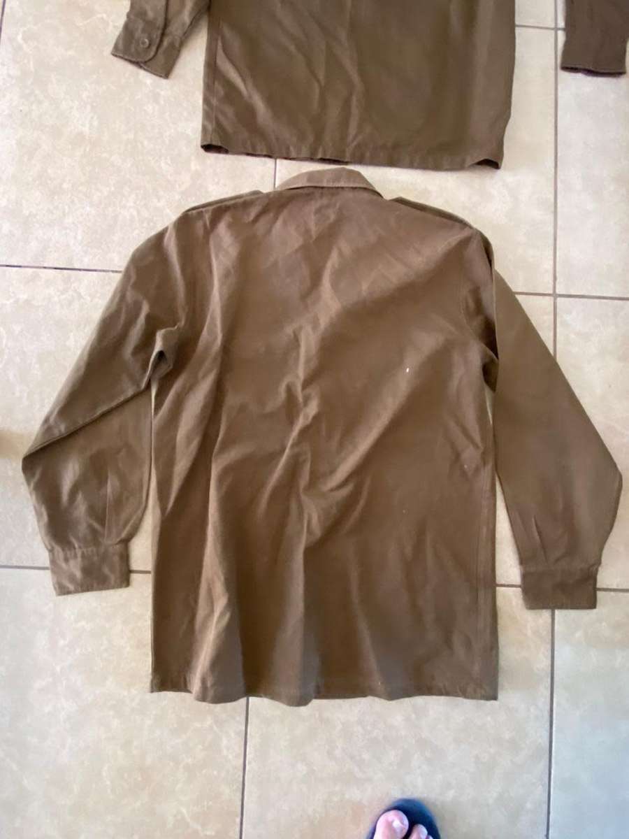 SADF NUTRIA,LONG SLEEVE SHIRTS-1X SMALL AND 1X MEDIUM-BOTH USED BUT GOOD CONDITION WITH AL BUTTONS