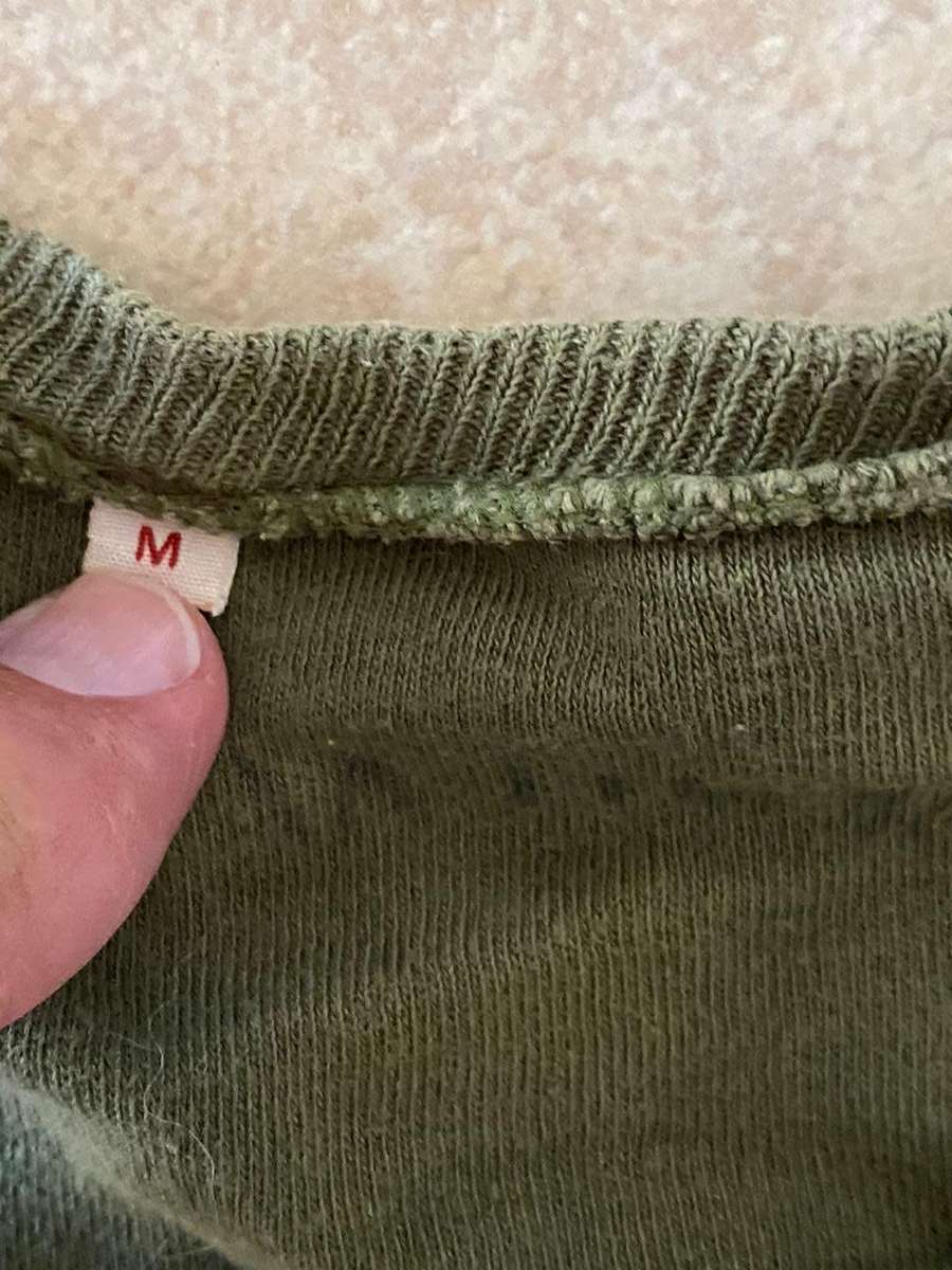 RHODESIAN T SHIRT-A SIZE MEDIUM- USED BUT GOOD-PEN MARKED-RAY WILSON