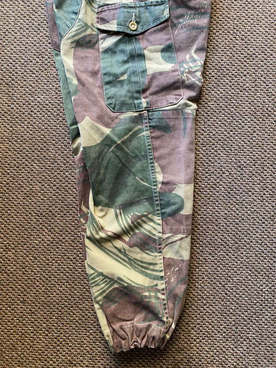 RHODESIA CAMO,TROUSERS,SIZE 32 TO 33-PLEASE LOOK AT MEASUREMENTS-PIPE LENGTH OF 72 CM-USED BUT GOOD