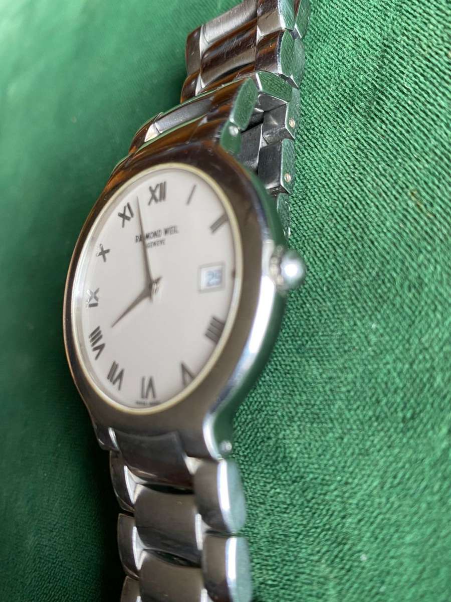 AUTHENTIC RAYMOND WEIL GENEVE,MENS WATCH-USED BUT VERY GOOD CONDITION,WITH STEEL STRAP-PERFECT RUNN