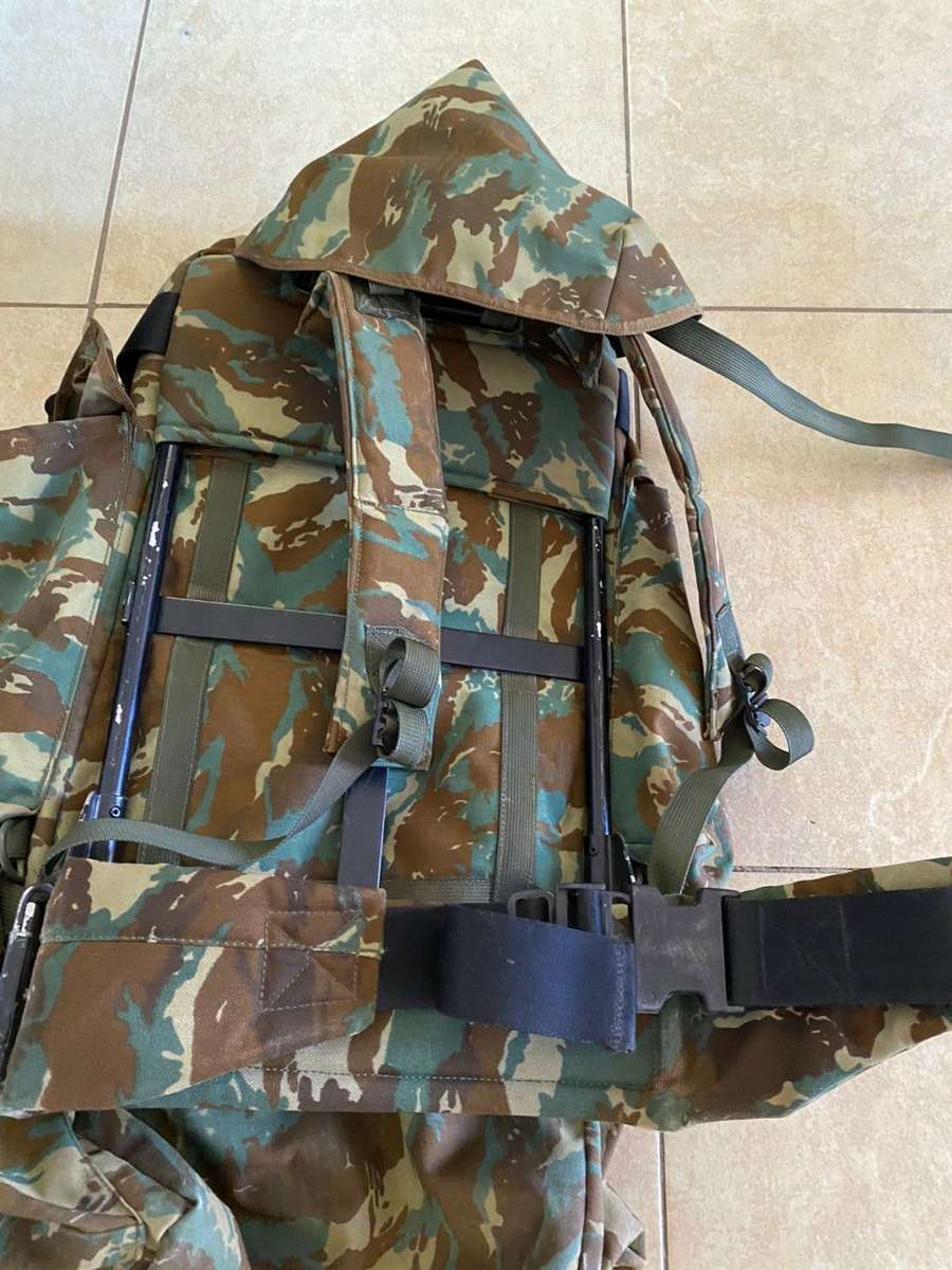 32 BATTALION,LARGE BACK PACK,WITH METAL H FRAME-PLEASE HAVE A LOOK AT PICS PLACED-THIS IS HOW I GOT