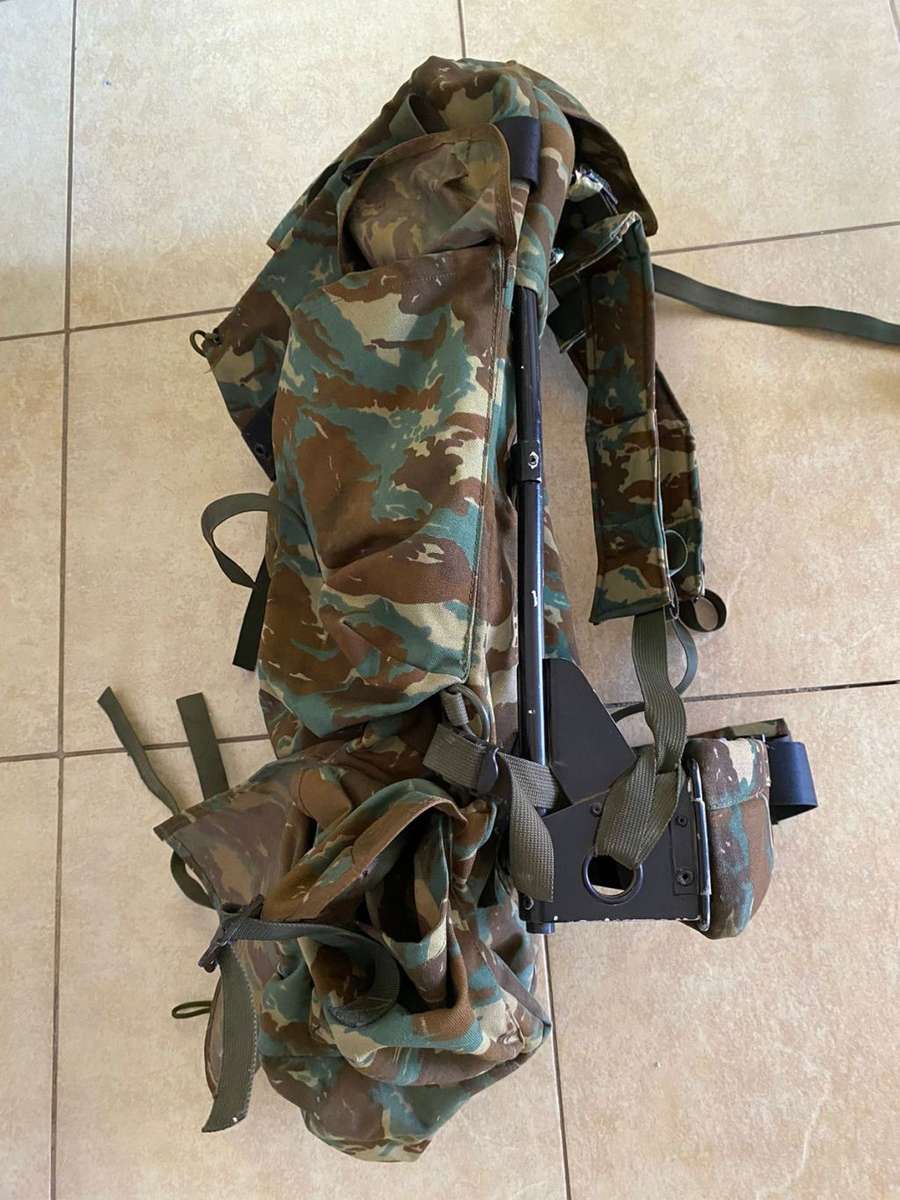 32 BATTALION,LARGE BACK PACK,WITH METAL H FRAME-PLEASE HAVE A LOOK AT PICS PLACED-THIS IS HOW I GOT