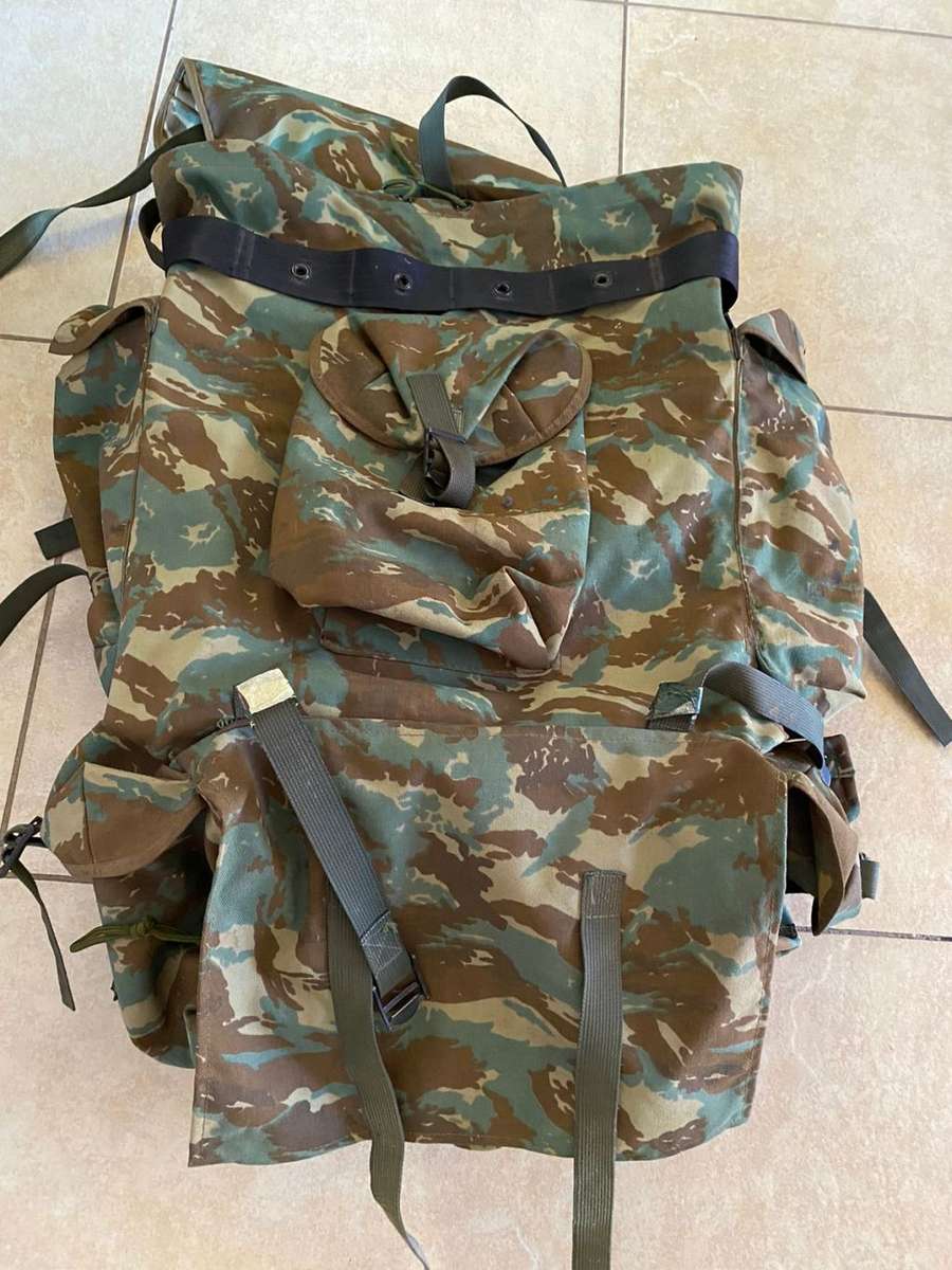 32 BATTALION,LARGE BACK PACK,WITH METAL H FRAME-PLEASE HAVE A LOOK AT PICS PLACED-THIS IS HOW I GOT
