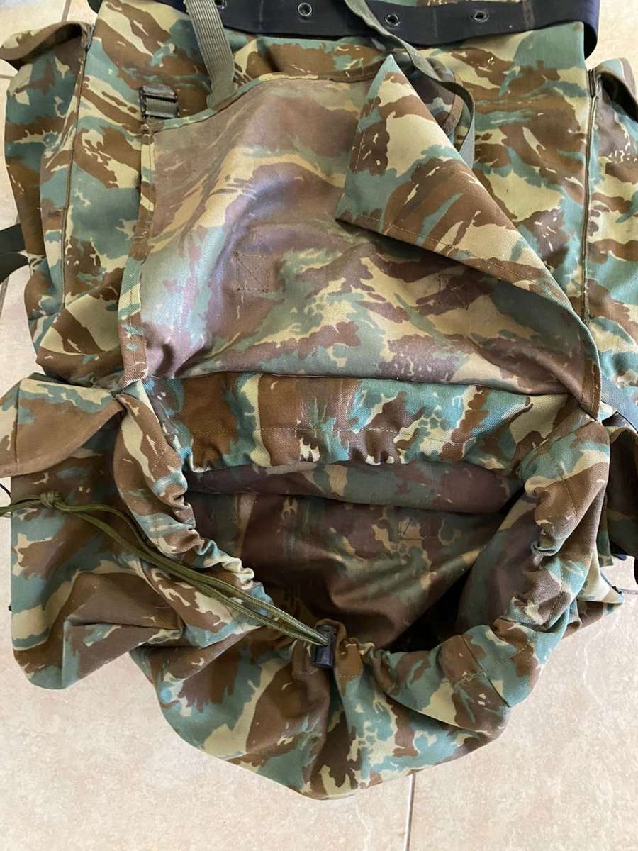 32 BATTALION,LARGE BACK PACK,WITH METAL H FRAME-PLEASE HAVE A LOOK AT PICS PLACED-THIS IS HOW I GOT