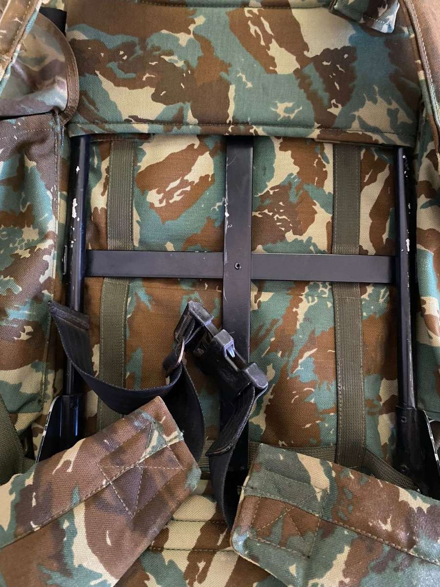 32 BATTALION,LARGE BACK PACK,WITH METAL H FRAME-PLEASE HAVE A LOOK AT PICS PLACED-THIS IS HOW I GOT