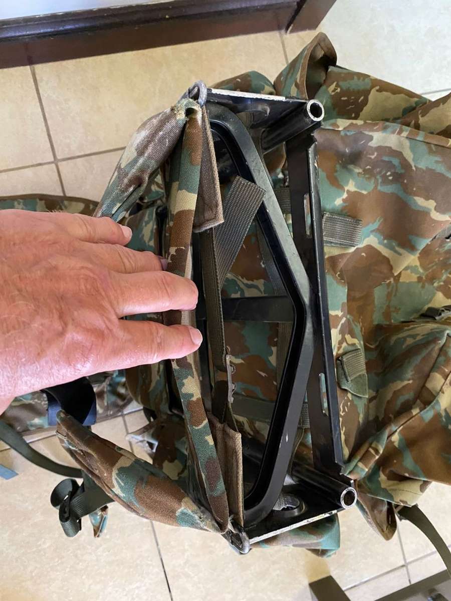 32 BATTALION,LARGE BACK PACK,WITH METAL H FRAME-PLEASE HAVE A LOOK AT PICS PLACED-THIS IS HOW I GOT