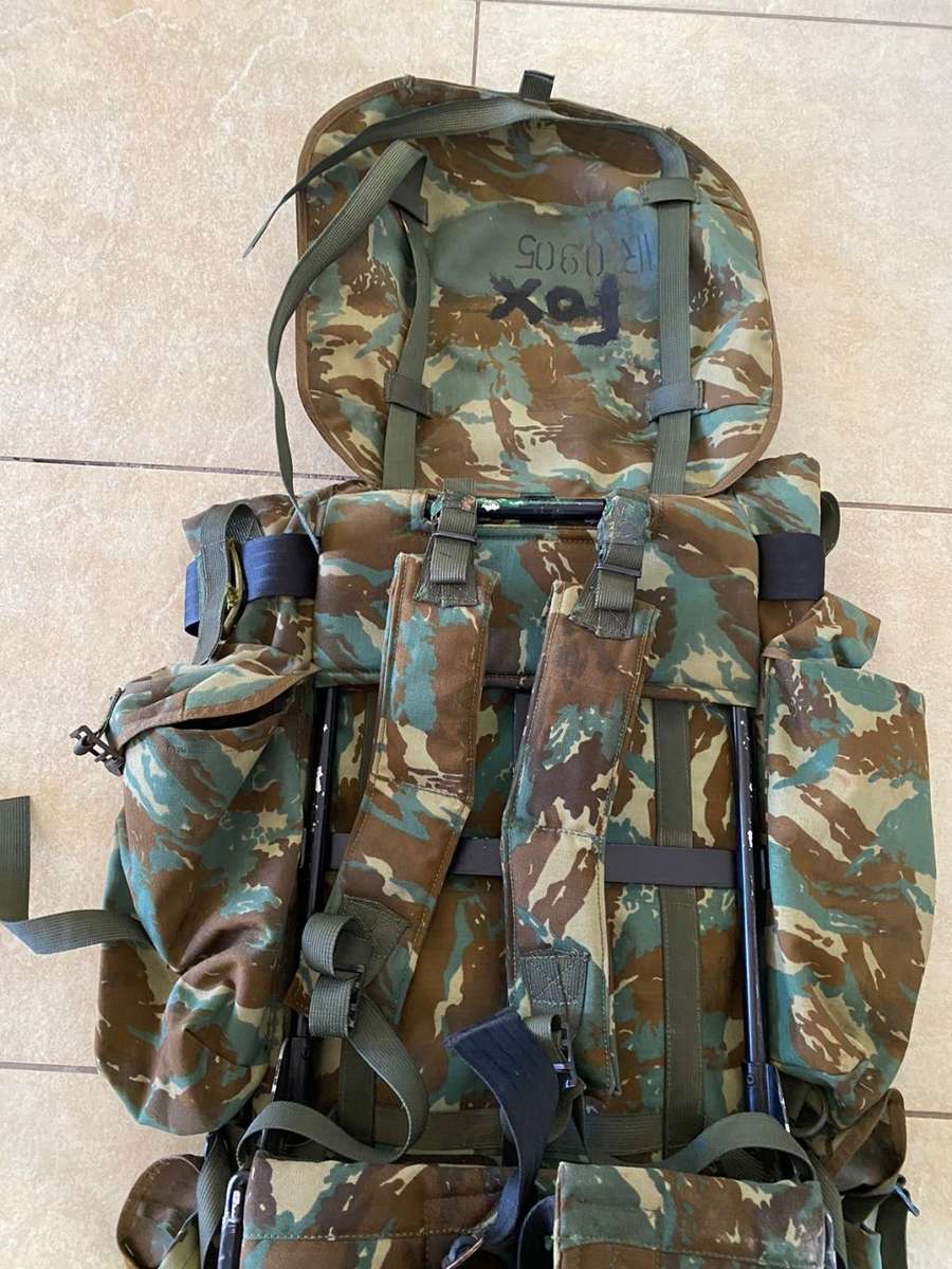32 BATTALION,LARGE BACK PACK,WITH METAL H FRAME-PLEASE HAVE A LOOK AT PICS PLACED-THIS IS HOW I GOT