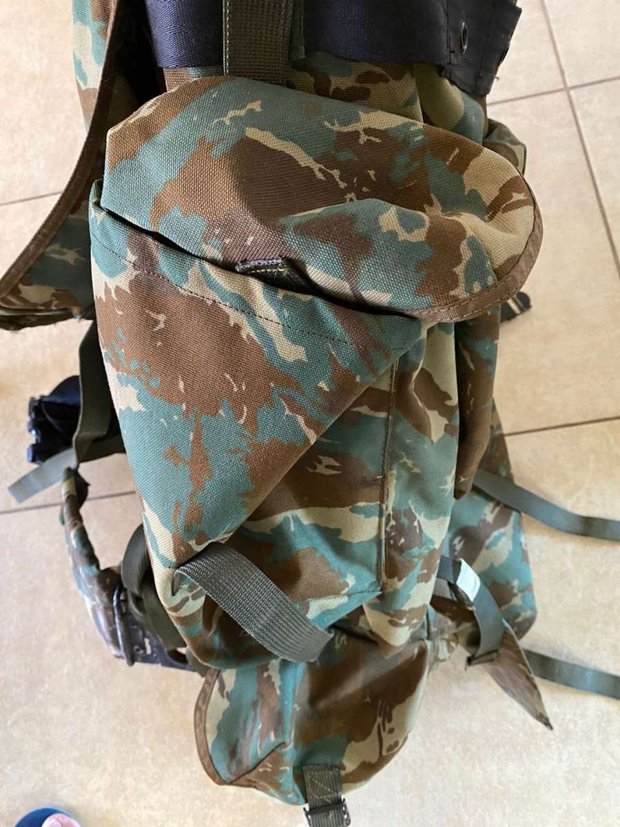32 BATTALION,LARGE BACK PACK,WITH METAL H FRAME-PLEASE HAVE A LOOK AT PICS PLACED-THIS IS HOW I GOT