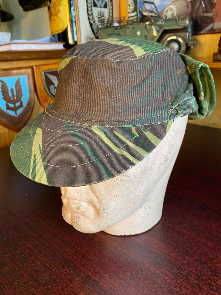 ORIGINAL RHODESIAN CAMO FLAP CAP-SIZE 57-THE CAP IS IN VERY GOOD CONDITION-ALMOST UNWORN