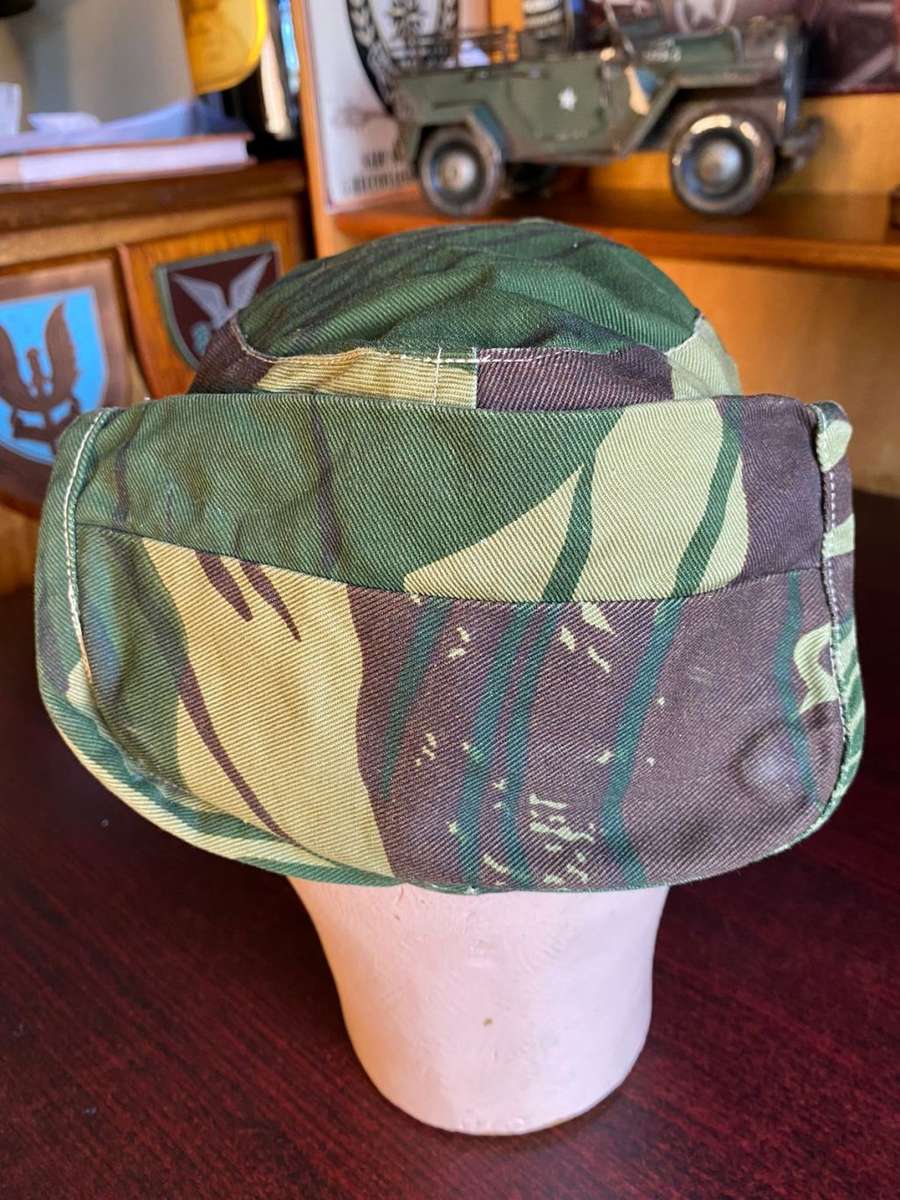 ORIGINAL RHODESIAN CAMO FLAP CAP-SIZE 57-THE CAP IS IN VERY GOOD CONDITION-ALMOST UNWORN