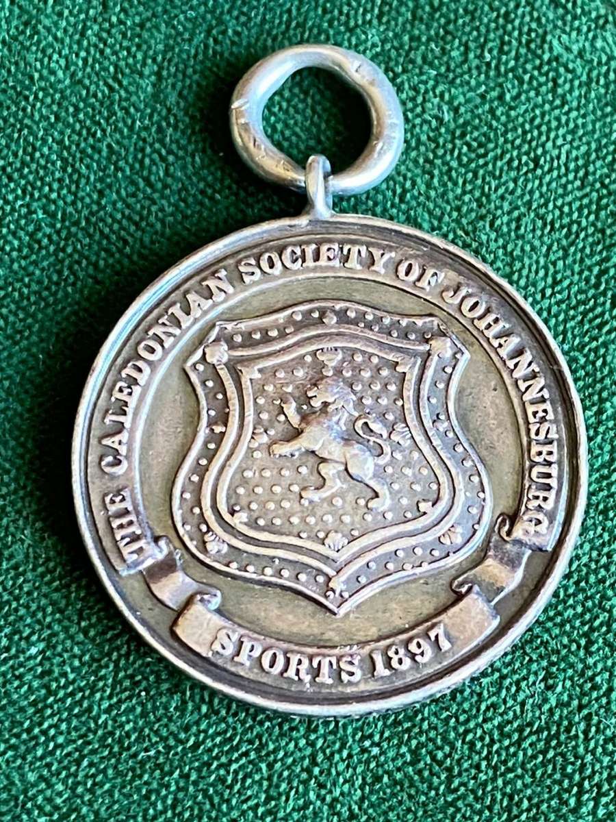 BOER WAR SPORTS 1897 CALEDONIAN SOCIETY OF JOHANNESBURG MEDAL-TOTAL WEIGHT 11,5G-DIAMETER 30 MM