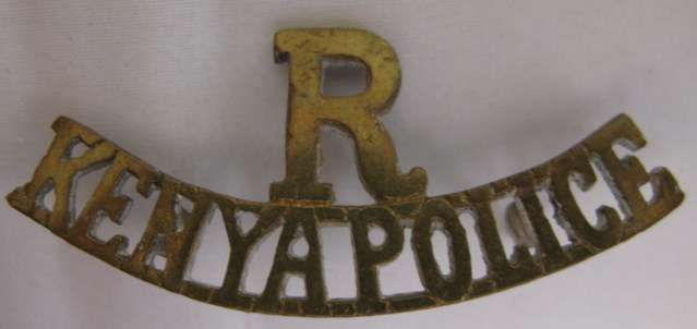 KENYA POLICE RESERVE BRASS SHOULDER TITLE - 2 LUGS