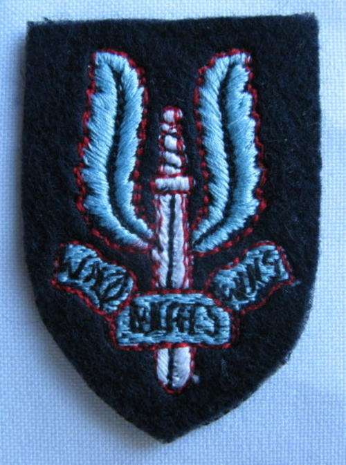 RHODESIAN SAS CLOTH BERET BADGE-LIGHT BLUE,WHITE,RED&BLACK COTTON EMBROIDERED ON BLACK FELT-1965-80-