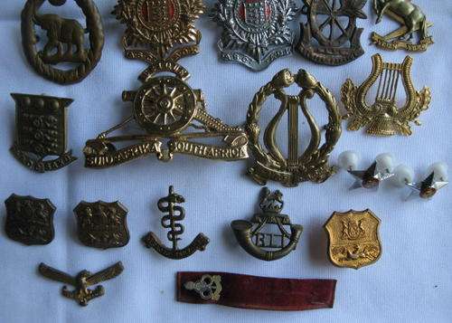 MIXED SELECTION OF 23 SA BADGES