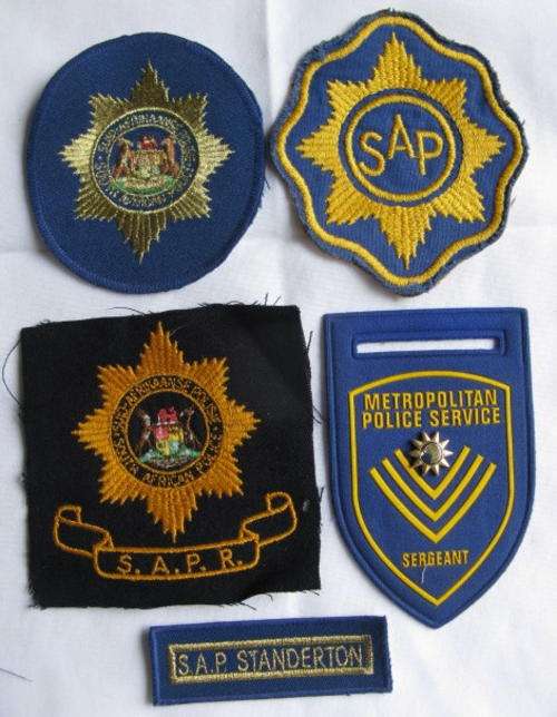 SA POLICE TRACKSUIT BADGE & 4 OTHER BADGES-SOLD TOGETHER