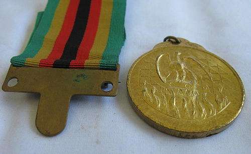FULL SIZE ZIMBABWE INDEPENDANCE MEDAL - NUMBERED