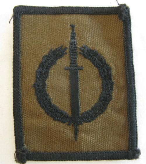 SA RECCE OPERATOR QUALIFICATION CLOTH BADGE - BLACK THREAD EMBROIDERED ON NUTRIA WITH BLACK MERROW B