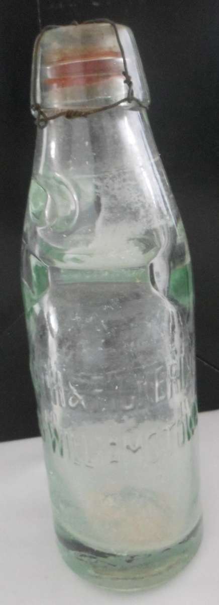 VINTAGE CODD BOTTLE WITH THE WORDS EMBOSSED ON THE FRONT: KUNATH & PICKERING - KING WILLIAMS TOWN -