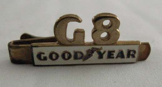 VINTAGE BRASS AND ENAMEL GOOD YEAR TIE PIN