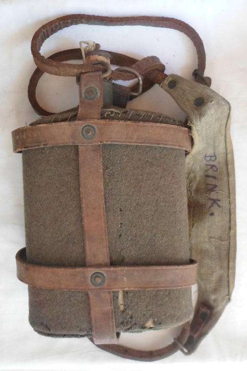 WW2 BRITISH OFFICERS WATER BOTTLE WITH FELT COVER & LEATHER CARRIER-THIS BOTTLE HAS THE NAME OF CAPT