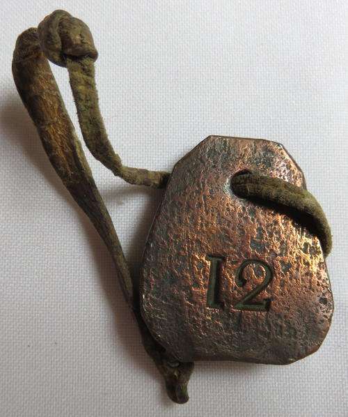 RARE ORIGINAL EAST AFRICA SLAVE BANGLE,BRASS STAMPED NO- ON LEATHER-MEASURES 38X32 MM