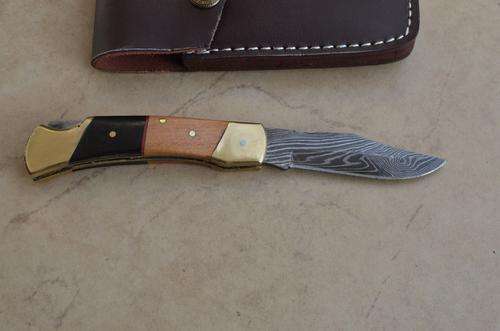 Handmade damascus steel folding knife with back lock