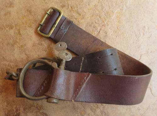 VINTAGE CIRCA 1950'S-60'S SAP CAVALRY LEATHER BELT WITH HANDCUFFS-THE HANDCUFFS MADE BY HIATT& STAMP