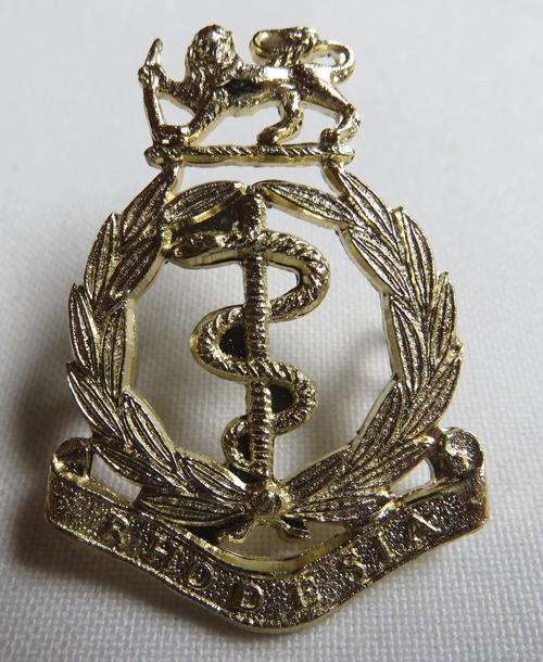 RHODESIA ARMY MEDICAL CORPS ANODISED METAL CAP BADGE- 2 LUGS