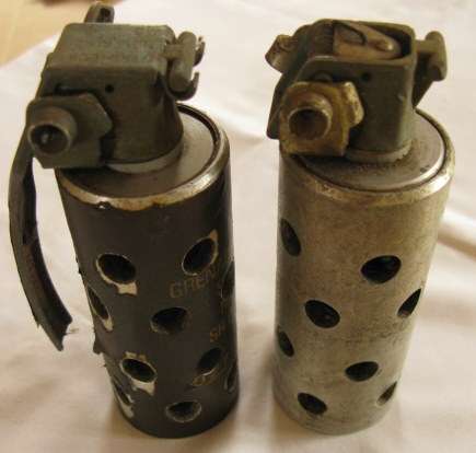 NO. 4053)  S.A.D.F. STUNHAND GRENADE M1A1-SR801B - TOTALLY INNERT- 1 COMPLETE / 1 UNCOMPLETE.