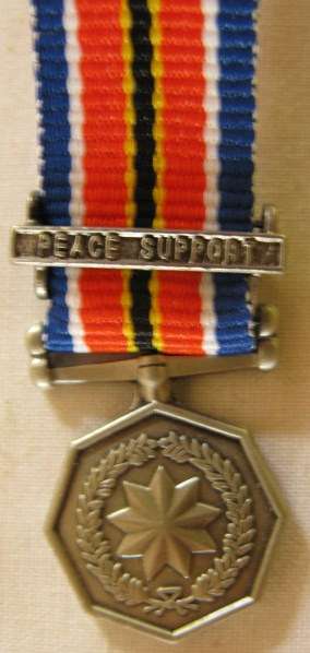 NO. 3715)  MINIATURE S.A.N.D.F. PEACE SUPPORT OPERATIONS.  MEDAL WITH BAR.