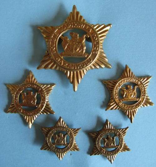 GAZANKULU POLICE CAP  + COLLARS + MESS DRESS BADGES - LUGS INTACT.