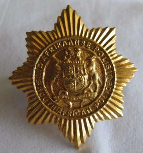 SAP BRASS CAP BADGE WITH SOLID CENTRE - 2 LUGS.