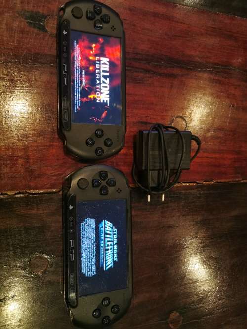 2 × Sony PSP consoles + Games and movies in good condition