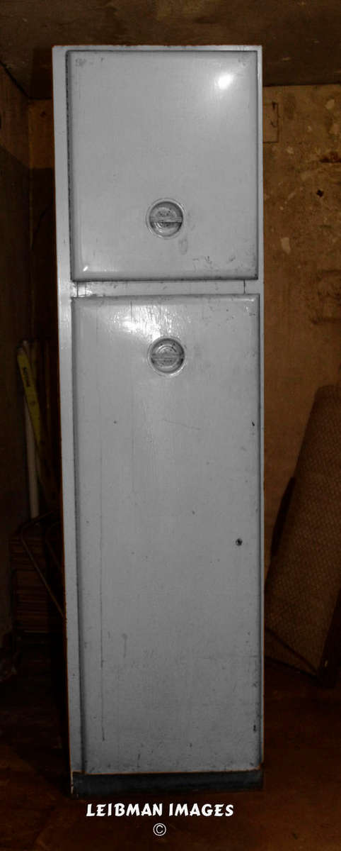2 DOOR STEEL CUPBOARD IN USABLE BUT SLIGHTLY SOILED CONDITION