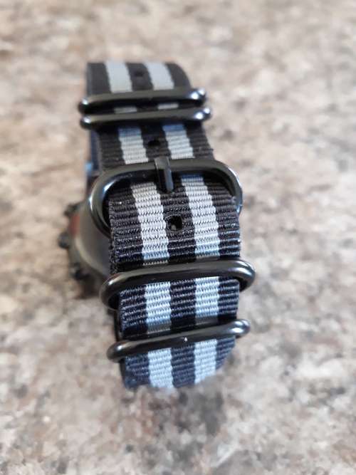 Emporio Armani with Brand new replacement 007 James Bond Nato strap.Pristine Condition