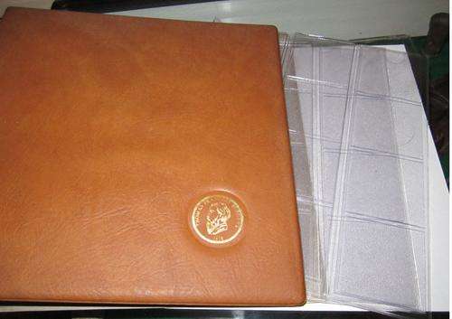 A 5 COIN FILE WITH 2 X 12 POCKET PAGES