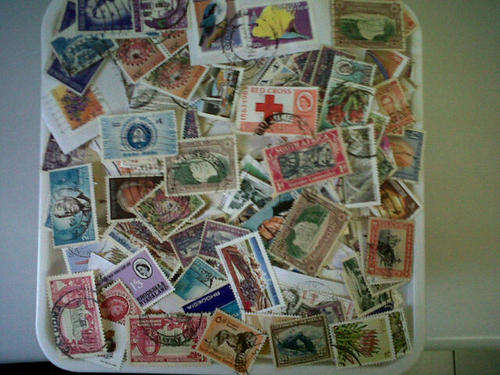 tub full of mixed stamps