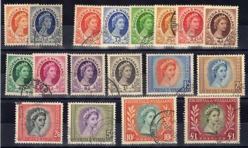 RHODESIA & NYASALAND 1954 DEFIN SET OF 16 VFU + 2 COIL STAMPS. SACC 1-15 + 1a & 2a. CAT R1258 (2018)