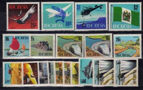 RHODESIA 1970 + 1973 DEFIN SETS OF 19 LIGHTLY MOUNTED MINT. SACC 196-214. CAT R985 FOR UMM.
