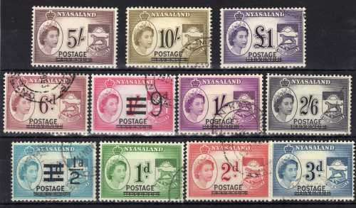 NYASALAND 1963 "POSTAGE" OVPT ON REVENUE STAMPS SET OF 11 VFU (5/- UMM) SG 188-98. CAT 24 GBP (2018)