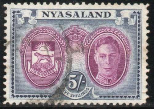 Nyasaland 1945 KGVI definitive 5/- purple and blue very fine used. SG 155. Cat £8,50 (2018)