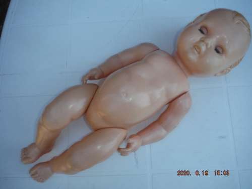 Early plastic sleeping doll.